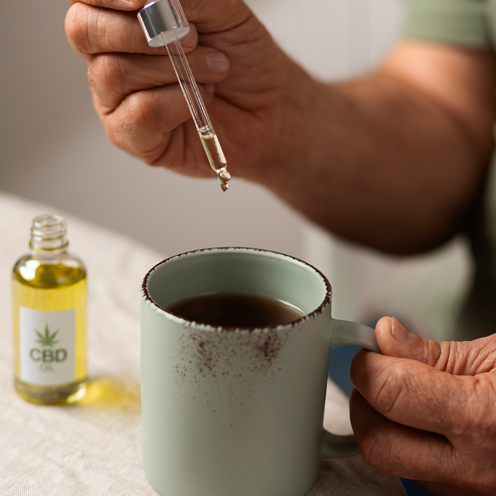 Cannabis oil bottle with coffee-style background symbolizing wellness in the owner's journey