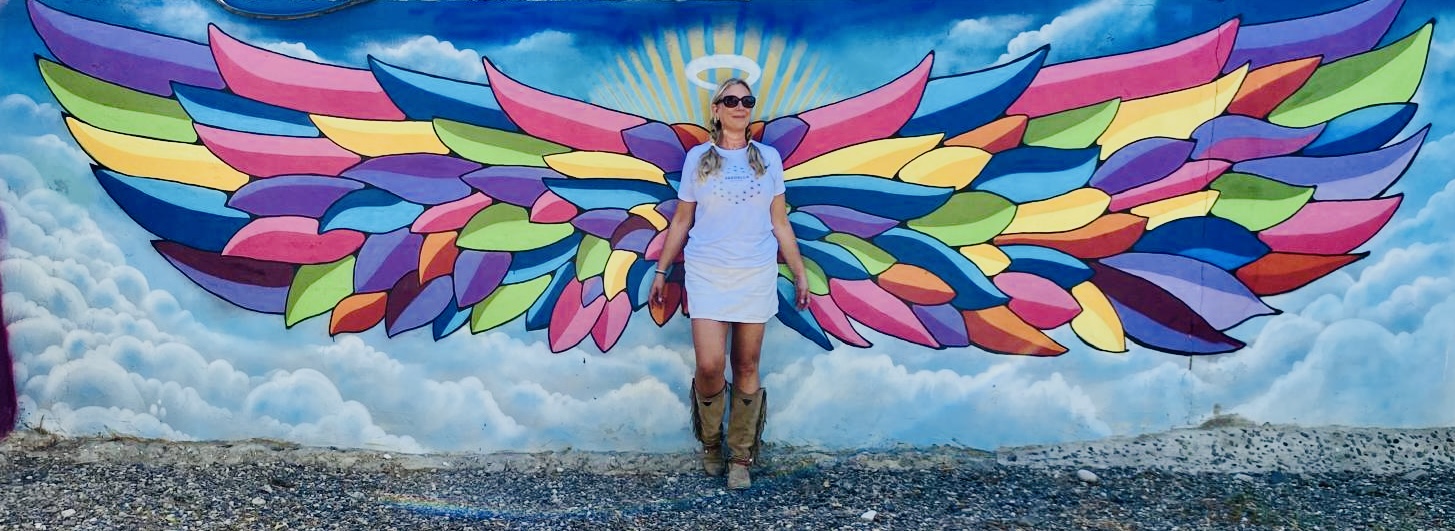 Seedella owner with wings background